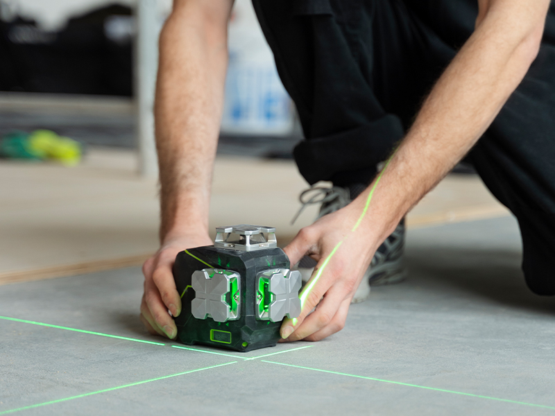 Construction worker preparing for concrete scanning
